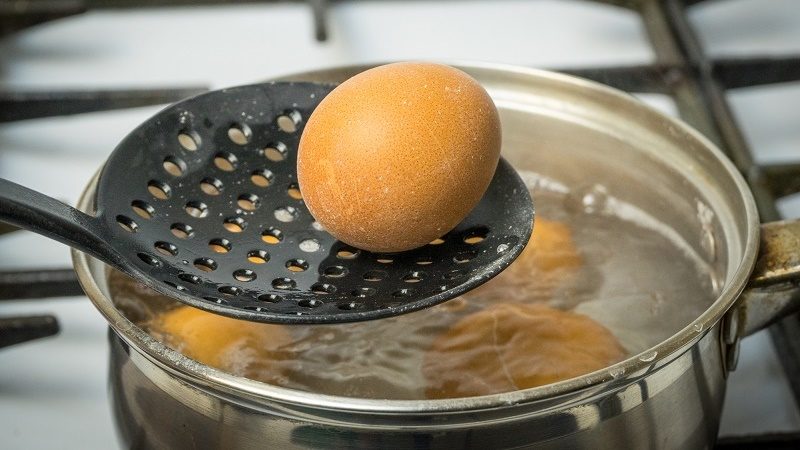 chicken-eggs-are-boiled-in-water-on-a-gas-stove